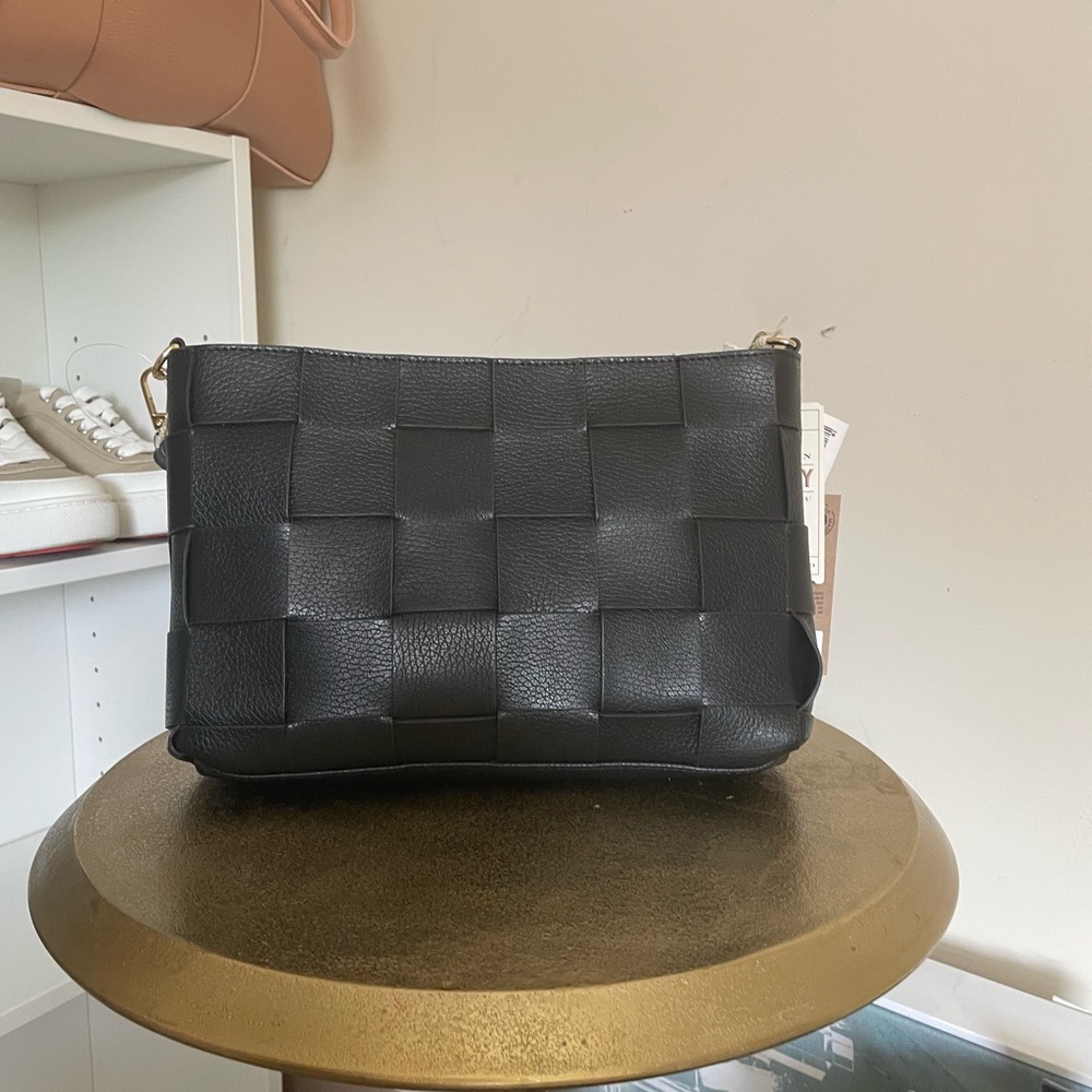 Black woven leather handbag
